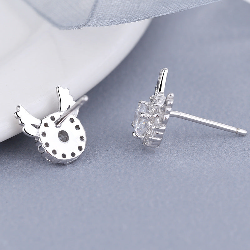 Women's earrings with sparkling crystals and playfully designed wings Hapa Style