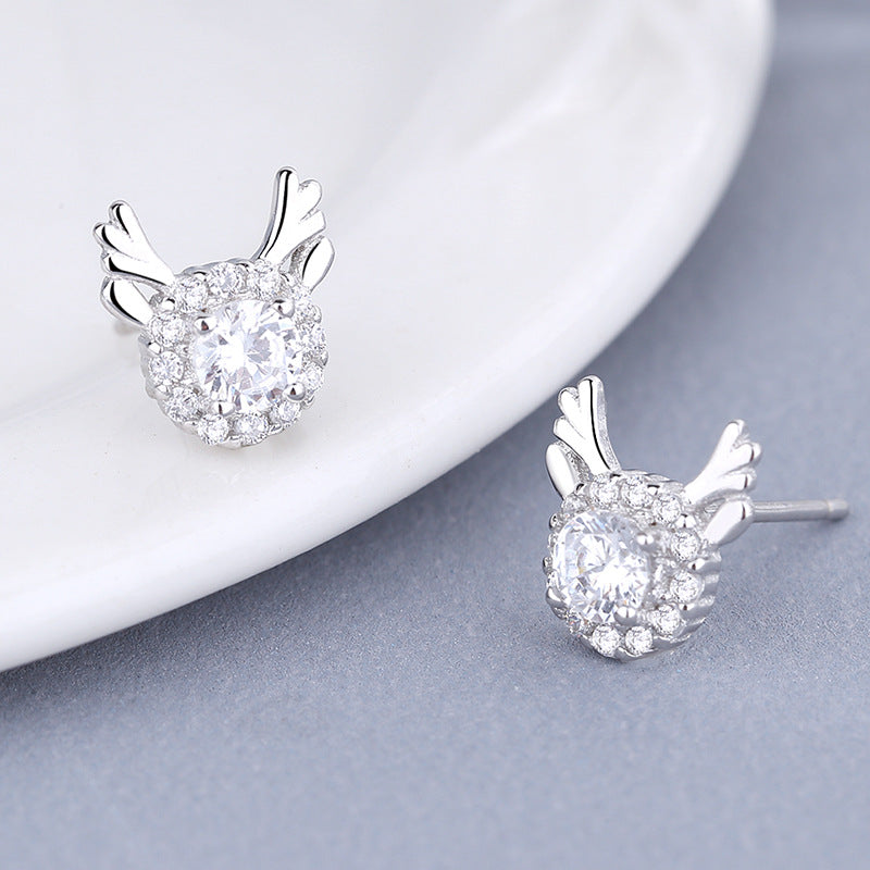 Women's earrings with sparkling crystals and playfully designed wings Hapa Style