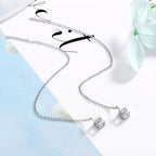 Women's earrings with elegant square pendant and shimmering zirconia Hapa Style