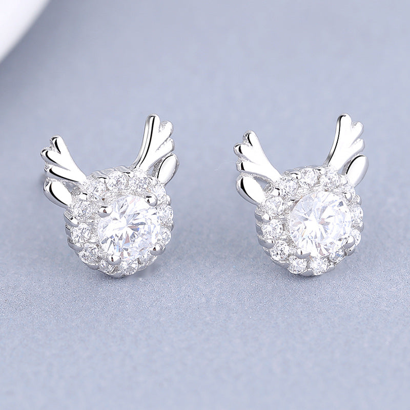 Women's earrings with sparkling crystals and playfully designed wings Hapa Style