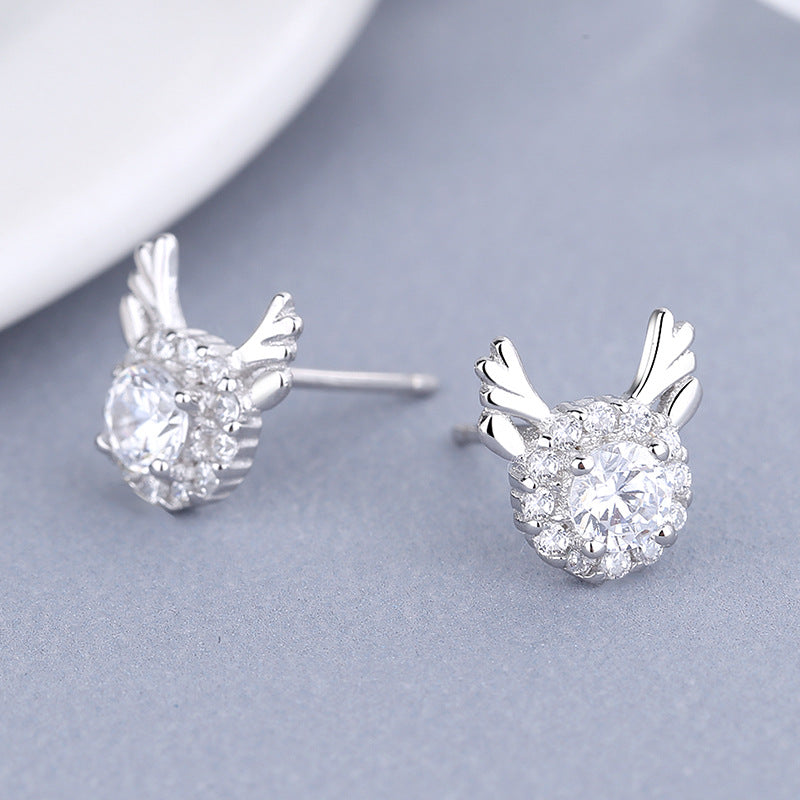 Women's earrings with sparkling crystals and playfully designed wings Hapa Style