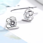 Women’s stud earrings with stylish heart design and sparkling crystals Hapa Style