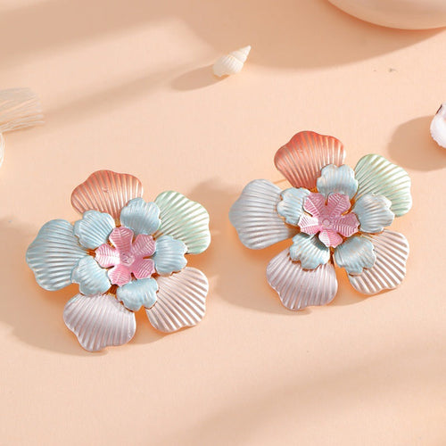 Ladies' flower earrings with intricate design and glossy accents Hapa Style