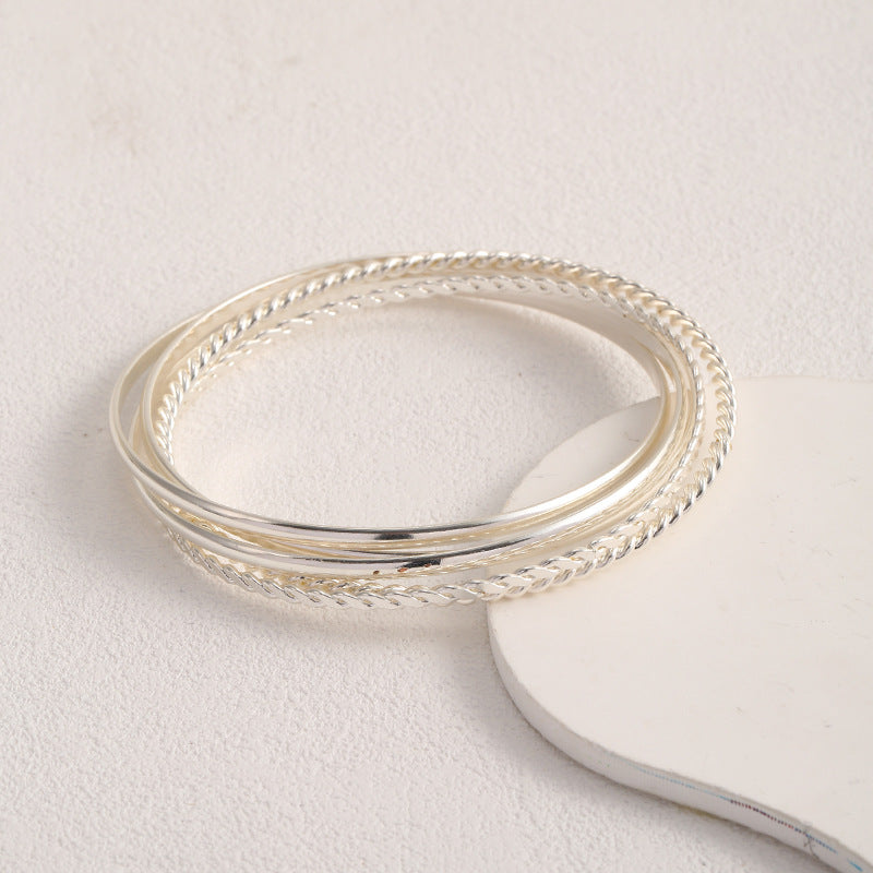 Women's bangle set with elaborate, braided and simple designs Hapa Style