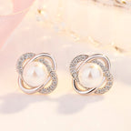 Ladies earrings with artistic pearl design and sparkling zirconia Hapa Style