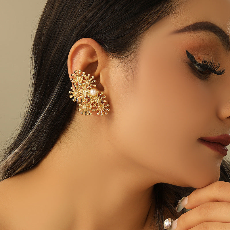 Women’s ear clips with elaborate flower design and pearl accent Hapa Style