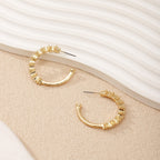 Ladies hoop earrings with intricate structures Hapa Style