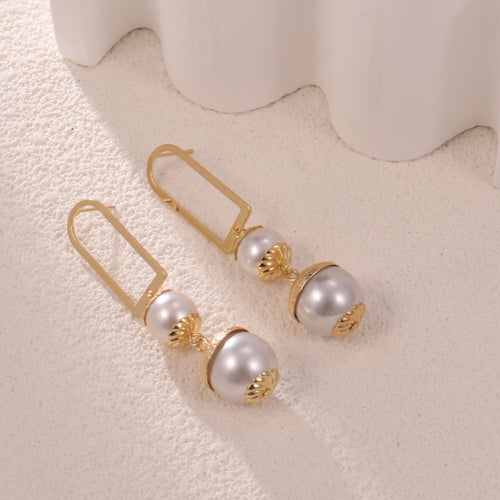 Ladies earrings with elegant pearl design Hapa Style