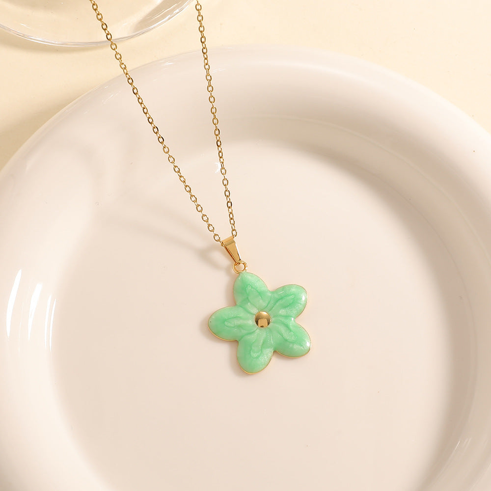 Women’s necklace with elaborately designed flower pendant Hapa Style