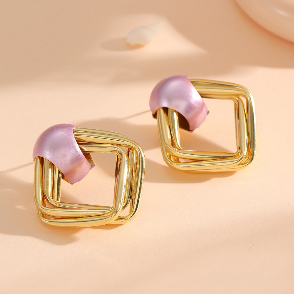 Women modern earrings with asymmetrical design Hapa Style