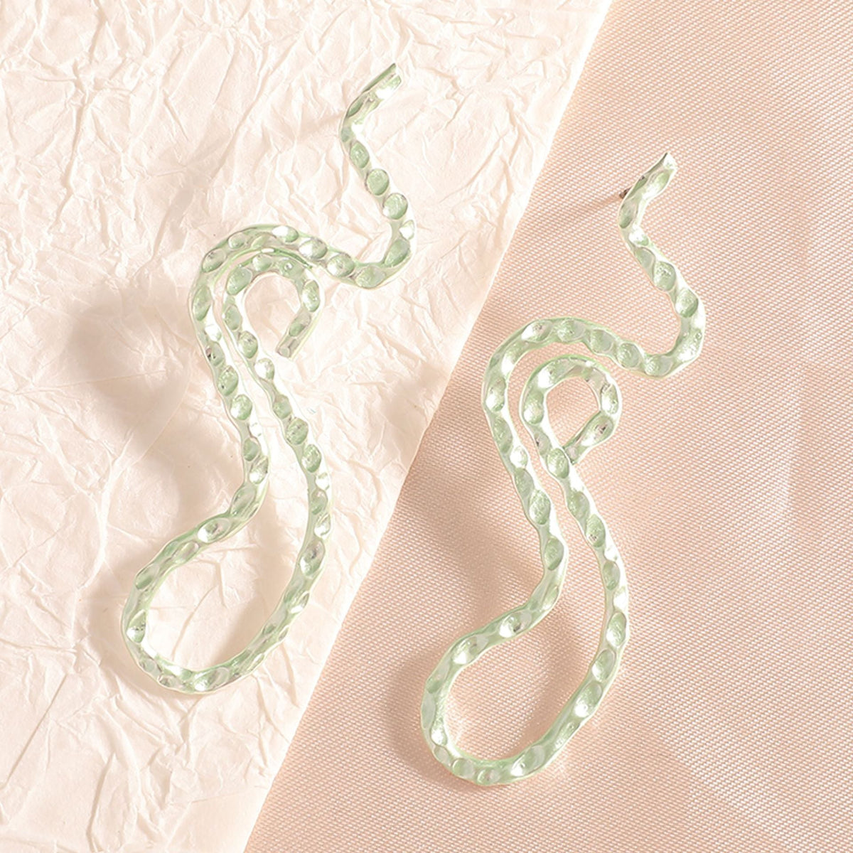 Ladies earrings in elegant wave pattern Hapa Style