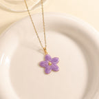 Women’s necklace with elaborately designed flower pendant Hapa Style