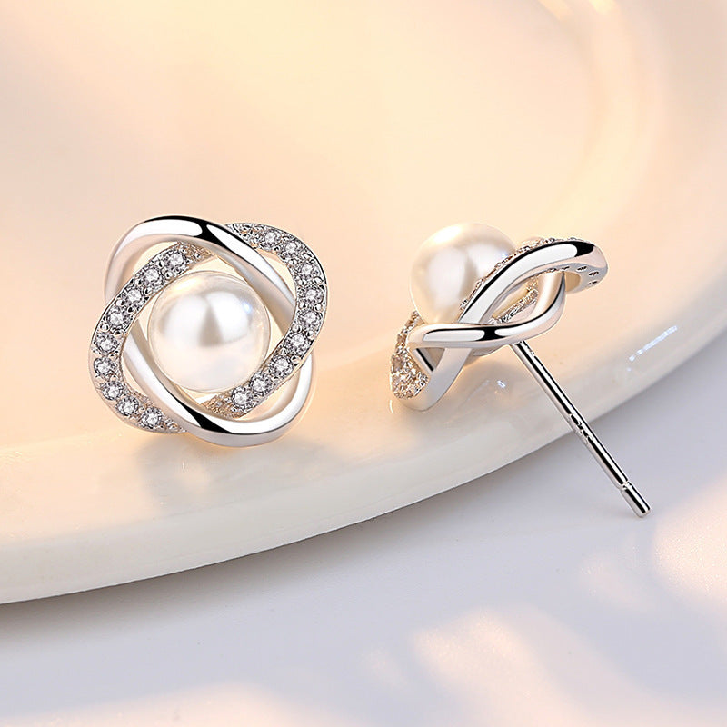 Ladies earrings with artistic pearl design and sparkling zirconia Hapa Style