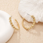 Ladies hoop earrings with intricate structures Hapa Style