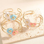Women's bangle with elaborate floral design Hapa Style