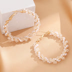 Ladies hoop earrings with luxurious pearl accents and elegant, twisted design Hapa Style