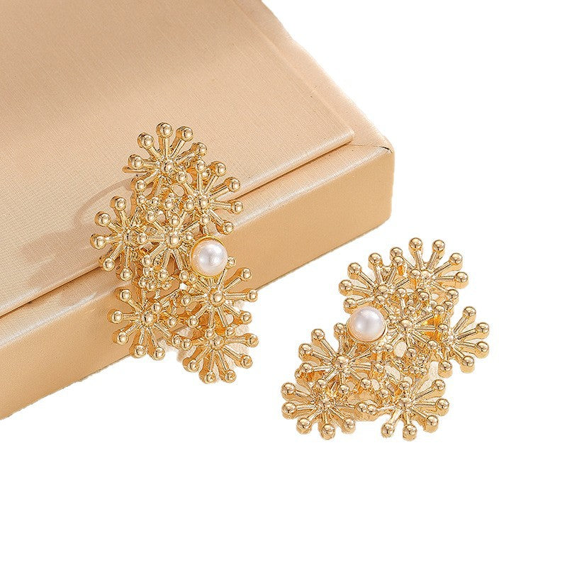 Women’s ear clips with elaborate flower design and pearl accent Hapa Style