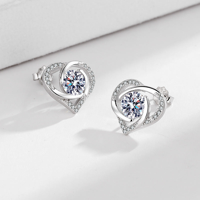Ladies earrings in elegant heart design with shimmering zirconia Hapa Style