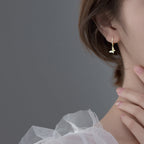 Ladies earrings with elegant butterfly design and sparkling details Hapa Style