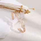 Women's bangle with elegant infinity pattern and sparkling zirconia Hapa Style