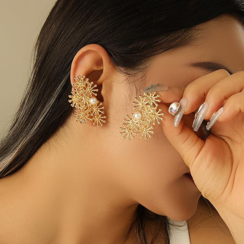 Women’s ear clips with elaborate flower design and pearl accent Hapa Style