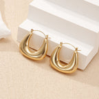 Ladies earrings in a modern, curved design Hapa Style