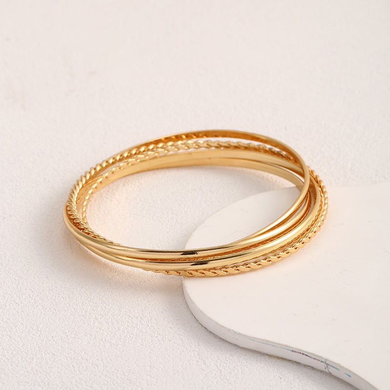 Women's bangle set with elaborate, braided and simple designs Hapa Style