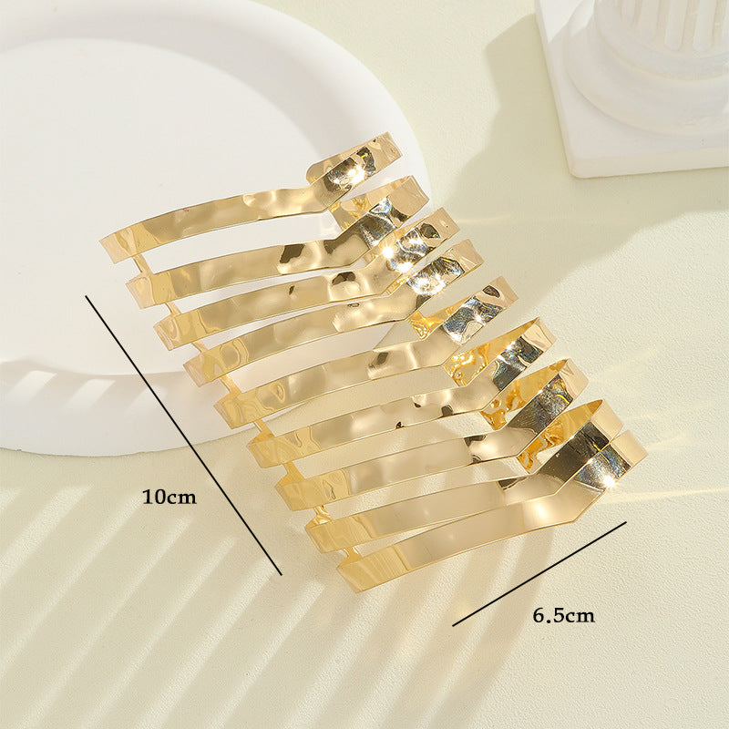 Women's hair accessories with shiny, curved elements Hapa Style