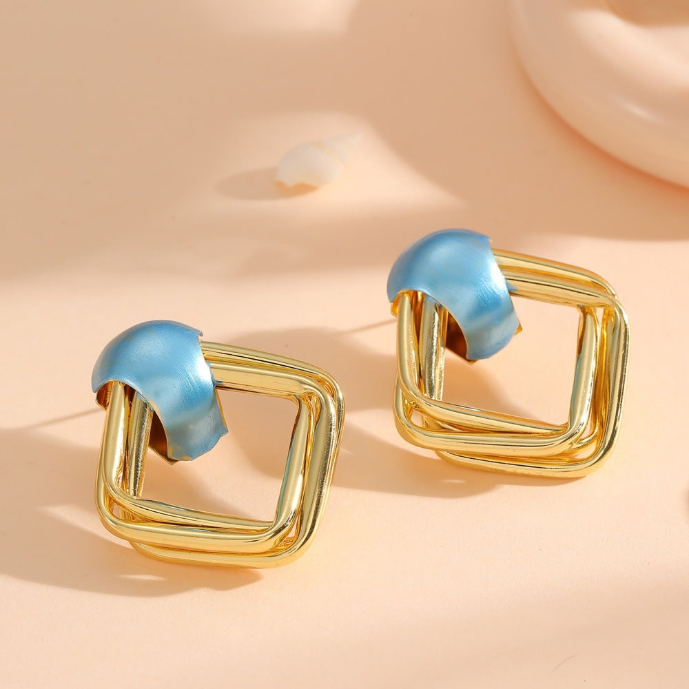 Women modern earrings with asymmetrical design Hapa Style