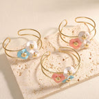 Women's bangle with elaborate floral design Hapa Style