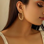 Ladies hoop earrings with intricate structures Hapa Style