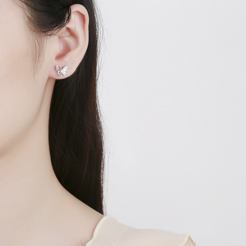 Ladies earrings in an elegant butterfly design with sparkling zirconia Hapa Style
