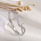 Women's bangle with elegant infinity pattern and sparkling zirconia Hapa Style