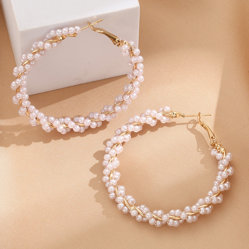 Ladies hoop earrings with luxurious pearl accents and elegant, twisted design Hapa Style