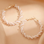 Ladies hoop earrings with luxurious pearl accents and elegant, twisted design Hapa Style