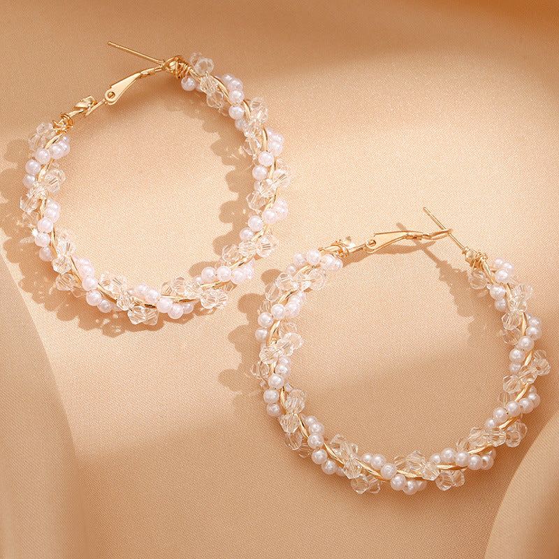 Ladies hoop earrings with luxurious pearl accents and elegant, twisted design Hapa Style