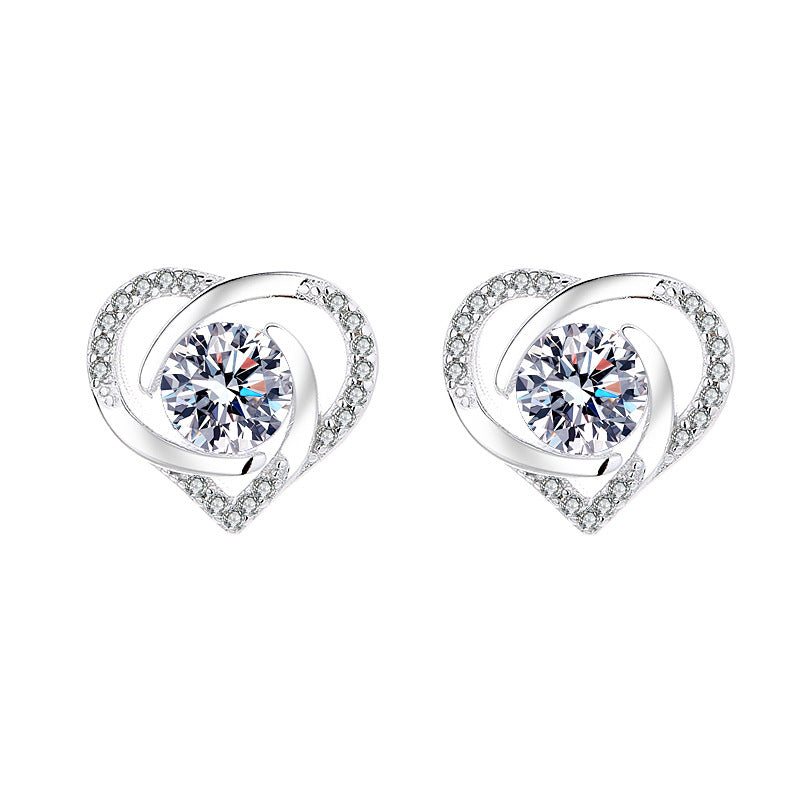 Ladies earrings in elegant heart design with shimmering zirconia Hapa Style