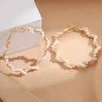 Ladies hoop earrings with luxurious pearl accents and elegant, twisted design Hapa Style