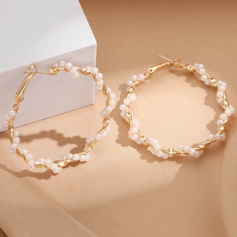 Ladies hoop earrings with luxurious pearl accents and elegant, twisted design Hapa Style