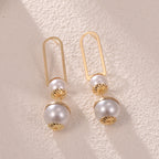 Ladies earrings with elegant pearl design Hapa Style