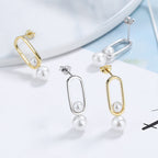 Women's stud earrings with modern oval design and elegant pearls Hapa Style