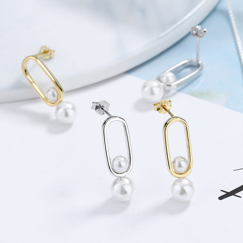 Women's stud earrings with modern oval design and elegant pearls Hapa Style