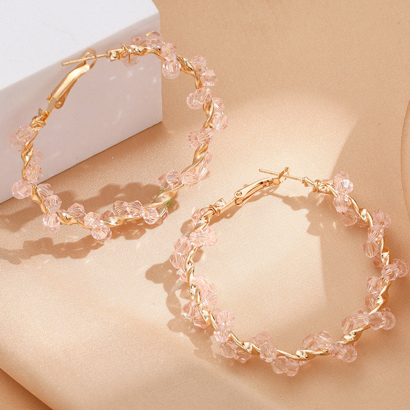 Ladies hoop earrings with luxurious pearl accents and elegant, twisted design Hapa Style