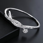 Women's bangle with elegant infinity pattern and sparkling zirconia Hapa Style