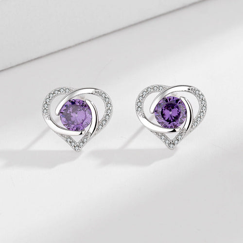 Ladies earrings in elegant heart design with shimmering zirconia Hapa Style